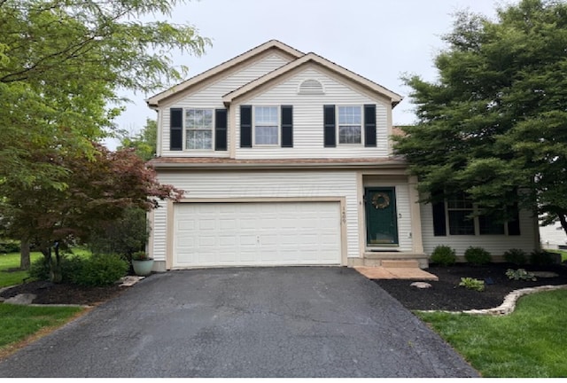 1400 Wild Horse Dr, Grove City, OH 43123 - traditional-style home featuring driveway and an attached garage