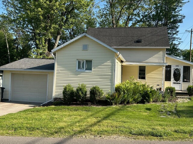 101 Meadow Ln, Gambier, OH 43022 - view of front of home with a front lawn, a garage, and concrete driveway