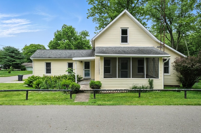 101 Meadow Ln, Gambier, OH 43022 - view of front facade featuring a front yard and roof with shingles