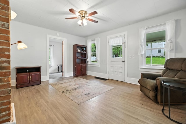 101 Meadow Ln, Gambier, OH 43022 - foyer entrance featuring healthy amount of natural light, a ceiling fan, and wood finished floors