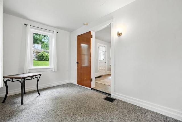 101 Meadow Ln, Gambier, OH 43022 - carpeted foyer entrance featuring baseboards