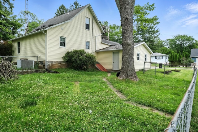 101 Meadow Ln, Gambier, OH 43022 - view of side of home with roof with shingles