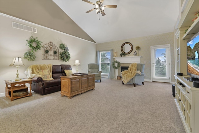 217 Warbler Ct, Pickerington, OH 43147 - living room with a ceiling fan, light carpet, a fireplace with flush hearth, high vaulted ceiling, and baseboards