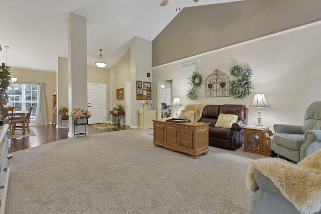 217 Warbler Ct, Pickerington, OH 43147 - living area featuring light carpet, ceiling fan, and high vaulted ceiling