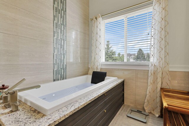 217 Warbler Ct, Pickerington, OH 43147 - full bathroom featuring tile walls