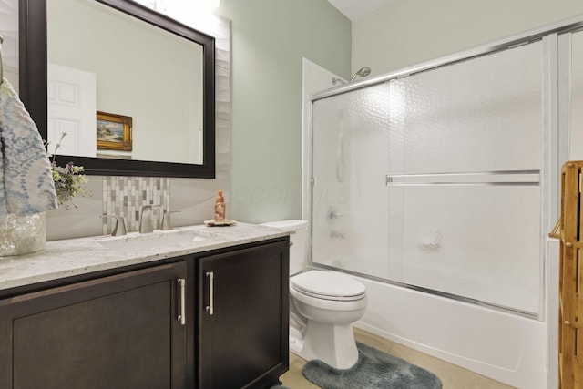 217 Warbler Ct, Pickerington, OH 43147 - full bath with vanity, toilet, enclosed tub / shower combo, and decorative backsplash