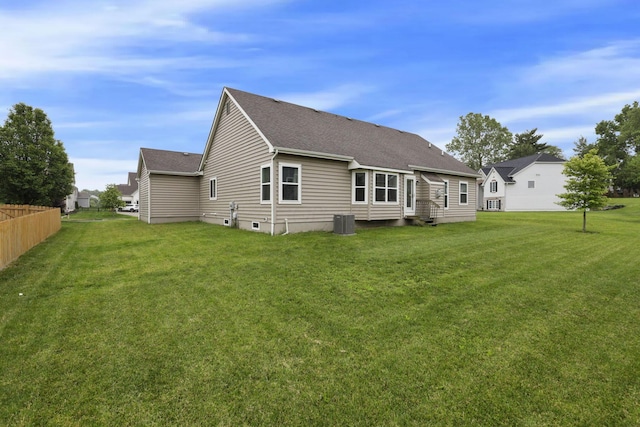 217 Warbler Ct, Pickerington, OH 43147 - rear view of house with cooling unit and a shingled roof