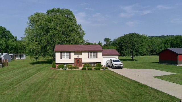 14629 Hock Hocking Rd, Logan, OH 43138 - raised ranch with a front lawn and a metal roof