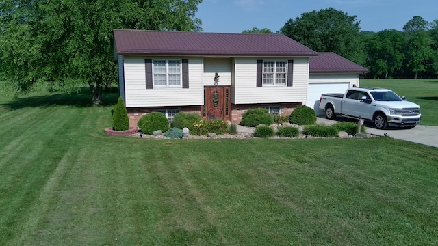 14629 Hock Hocking Rd, Logan, OH 43138 - raised ranch with a front lawn, a garage, and a metal roof