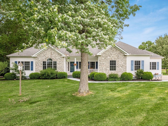 1397 Horseshoe Rd, Delaware, OH 43015 - single story home featuring stone siding, a front yard, and a shingled roof
