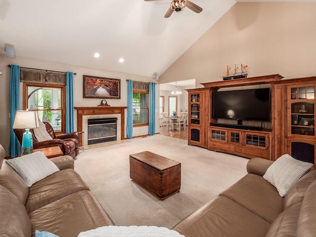 1397 Horseshoe Rd, Delaware, OH 43015 - carpeted living area with a chandelier, a ceiling fan, recessed lighting, a high end fireplace, and high vaulted ceiling