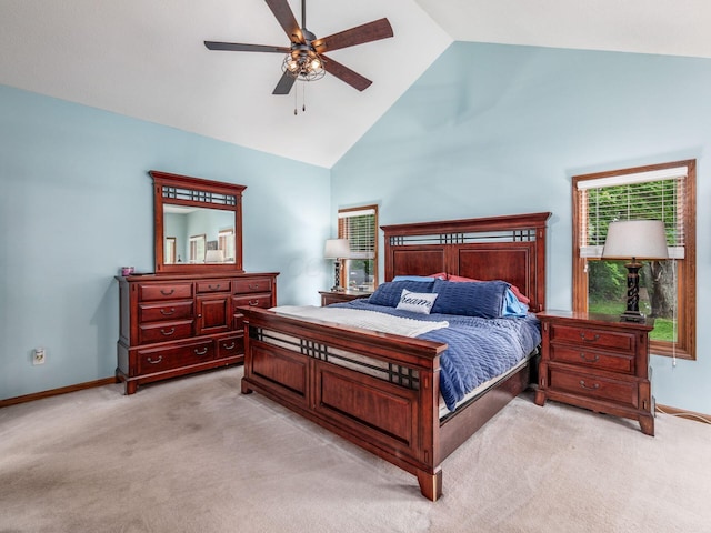 1397 Horseshoe Rd, Delaware, OH 43015 - bedroom with light colored carpet, high vaulted ceiling, baseboards, and ceiling fan