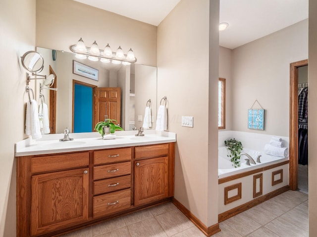 1397 Horseshoe Rd, Delaware, OH 43015 - bathroom with tile patterned flooring, double vanity, and a garden tub
