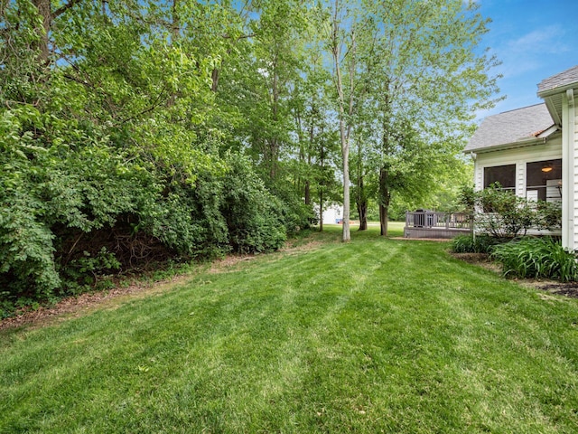 1397 Horseshoe Rd, Delaware, OH 43015 - view of grassy yard featuring a wooden deck