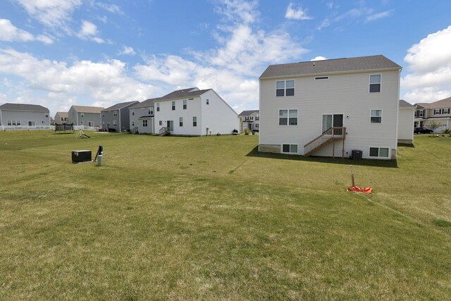 211 Whitetail Trl, Johnstown, OH 43031 - rear view of property with a residential view and a yard