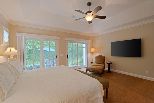 7699 Clear Creek Ct, Blacklick, OH 43004 - carpeted bedroom featuring access to exterior, a tray ceiling, multiple windows, and crown molding