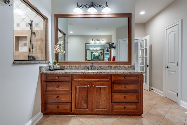 7699 Clear Creek Ct, Blacklick, OH 43004 - bathroom featuring vanity, baseboards, and tile patterned flooring