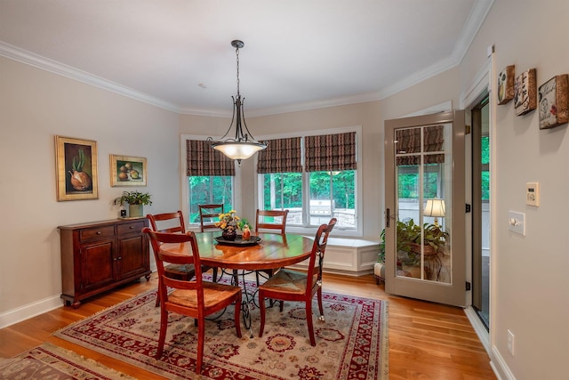 7699 Clear Creek Ct, Blacklick, OH 43004 - dining area with ornamental molding and light wood-style floors