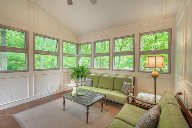7699 Clear Creek Ct, Blacklick, OH 43004 - sunroom with a decorative wall, outdoor lounge area, vaulted ceiling, and tile patterned floors