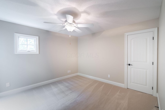 7699 Clear Creek Ct, Blacklick, OH 43004 - spare room featuring ceiling fan, carpet, and baseboards