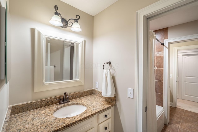 7699 Clear Creek Ct, Blacklick, OH 43004 - bathroom featuring vanity, tiled shower, and tile patterned flooring