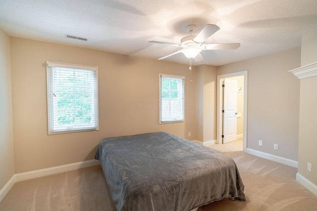 7699 Clear Creek Ct, Blacklick, OH 43004 - bedroom with light colored carpet, baseboards, and a ceiling fan