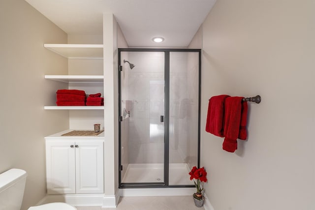 7699 Clear Creek Ct, Blacklick, OH 43004 - full bathroom with toilet, a shower stall, tile patterned flooring, and baseboards