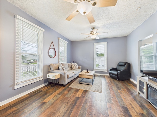 1708 Cedar Hill Rd, Lancaster, OH 43130 - living room with hardwood / wood-style flooring, a ceiling fan, a textured ceiling, and baseboards