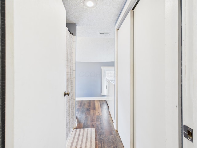 1708 Cedar Hill Rd, Lancaster, OH 43130 - hallway with a textured ceiling, wood finished floors, and baseboards