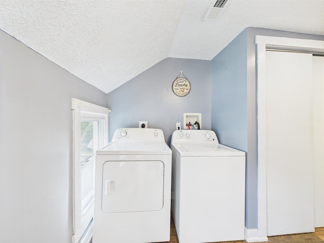 1708 Cedar Hill Rd, Lancaster, OH 43130 - laundry room with independent washer and dryer, a textured ceiling, and wood finished floors