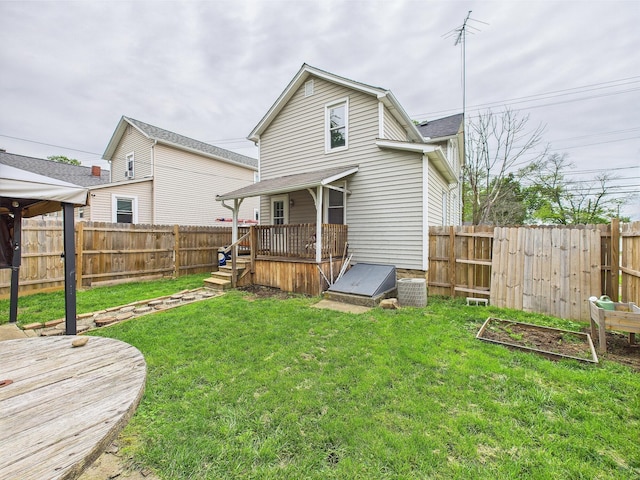 1708 Cedar Hill Rd, Lancaster, OH 43130 - back of house featuring a deck and central AC