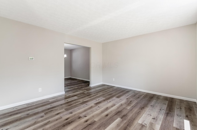 3248 Medoma Dr, Columbus, OH 43204 - unfurnished room with wood finished floors and baseboards