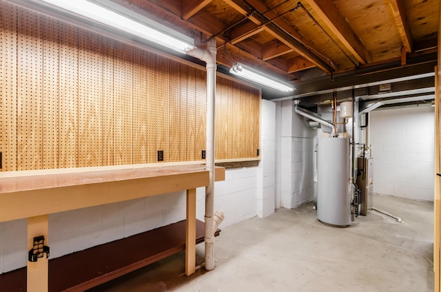 3248 Medoma Dr, Columbus, OH 43204 - unfinished below grade area featuring water heater and concrete block wall