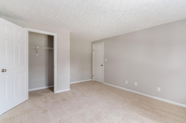 3248 Medoma Dr, Columbus, OH 43204 - unfurnished bedroom with carpet, a textured ceiling, and a closet