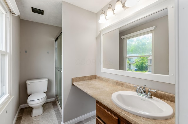 3248 Medoma Dr, Columbus, OH 43204 - full bathroom with vanity and a shower with door