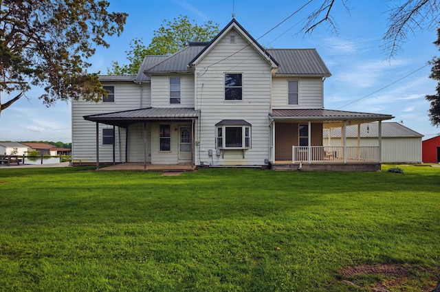1282 Taylortown Rd, Mansfield, OH 44903 - back of property featuring a porch, a lawn, metal roof, and a standing seam roof