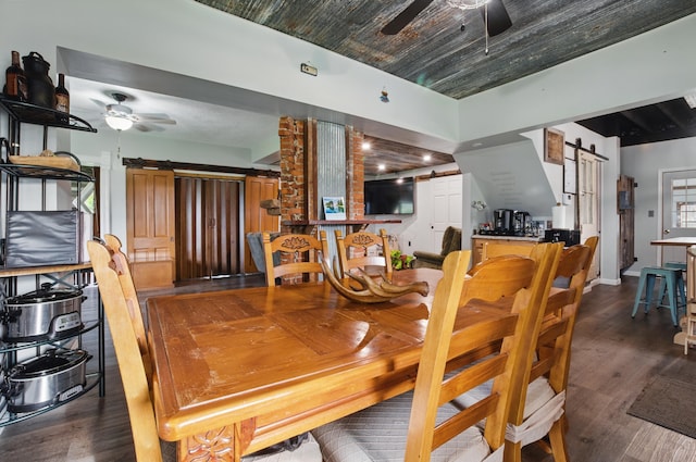 1282 Taylortown Rd, Mansfield, OH 44903 - dining space with a barn door, ceiling fan, and wood finished floors
