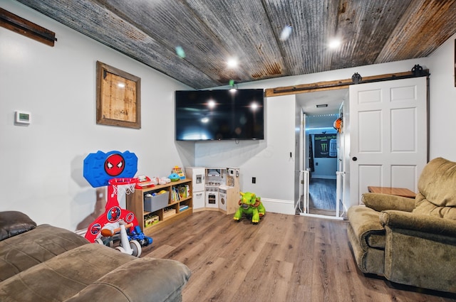 1282 Taylortown Rd, Mansfield, OH 44903 - living area featuring a barn door, wood finished floors, baseboards, and recessed lighting