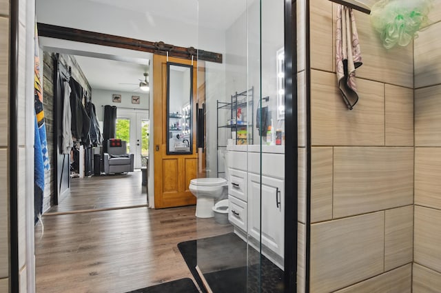 1282 Taylortown Rd, Mansfield, OH 44903 - bathroom featuring toilet, wood finished floors, ceiling fan, and vanity