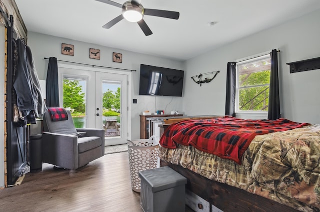1282 Taylortown Rd, Mansfield, OH 44903 - bedroom featuring access to outside, wood finished floors, french doors, and a ceiling fan
