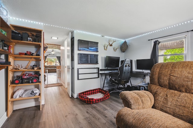 1282 Taylortown Rd, Mansfield, OH 44903 - home office featuring wood finished floors, a ceiling fan, and baseboards