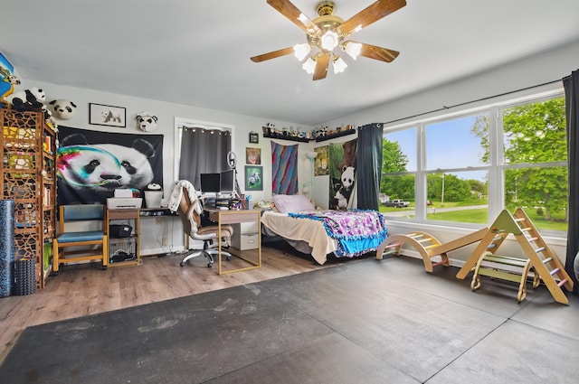 1282 Taylortown Rd, Mansfield, OH 44903 - bedroom featuring a ceiling fan, wood finished floors, and an office area