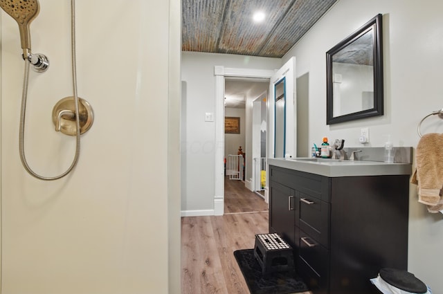 1282 Taylortown Rd, Mansfield, OH 44903 - bathroom featuring wood finished floors, vanity, a shower, and baseboards
