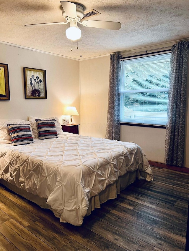 3037 La Vista Dr Unit 39, Columbus, OH 43204 - bedroom featuring a textured ceiling, wood finished floors, ceiling fan, and ornamental molding
