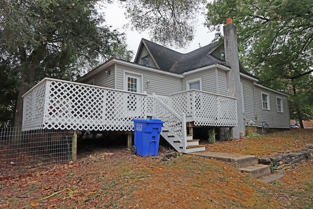 301 W Marion St, Mount Gilead, OH 43338 - view of side of property with a wooden deck, a chimney, and a shingled roof