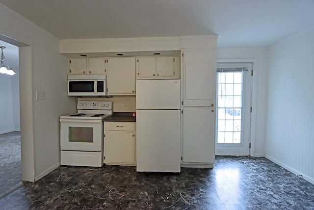 301 W Marion St, Mount Gilead, OH 43338 - kitchen featuring white appliances, baseboards, crown molding, dark countertops, and a chandelier