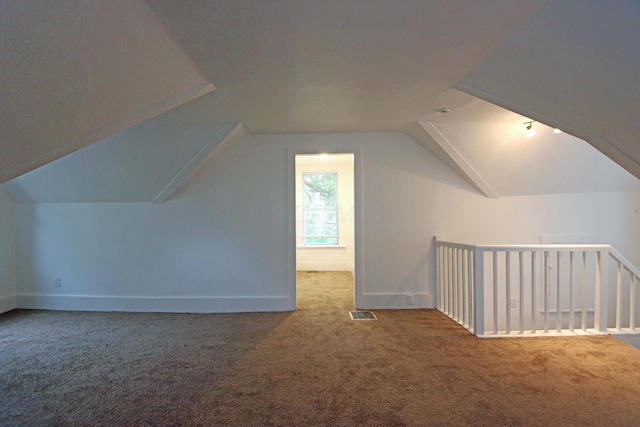 301 W Marion St, Mount Gilead, OH 43338 - bonus room with carpet floors, lofted ceiling, and baseboards