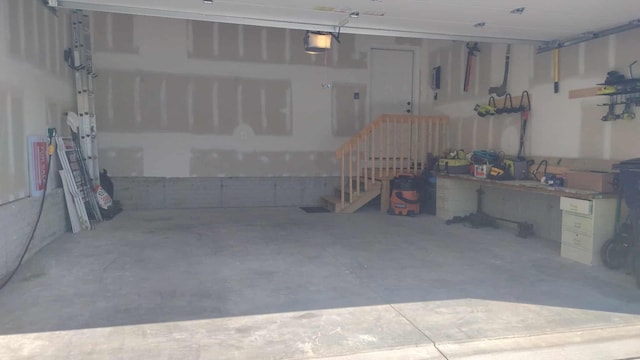 187 Twin Creek Way, Lancaster, OH 43130 - garage featuring electric panel and a garage door opener