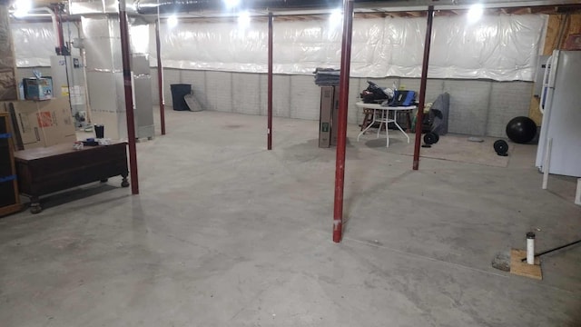 187 Twin Creek Way, Lancaster, OH 43130 - unfinished below grade area with freestanding refrigerator and gas water heater