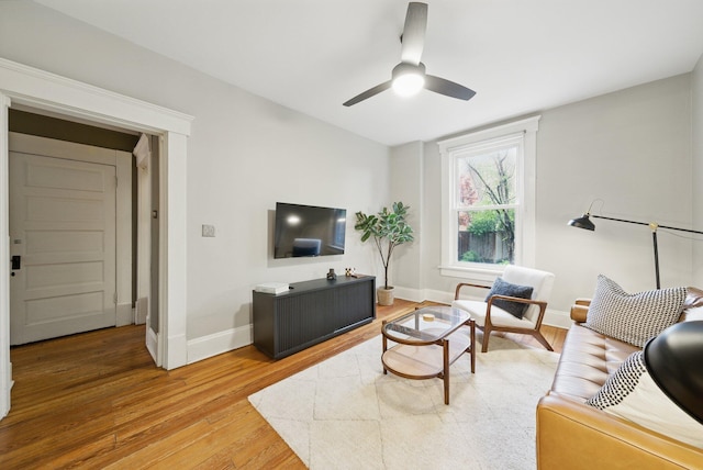 420 Stanley Ave, Columbus, OH 43206 - living area with light wood-style flooring, baseboards, and a ceiling fan